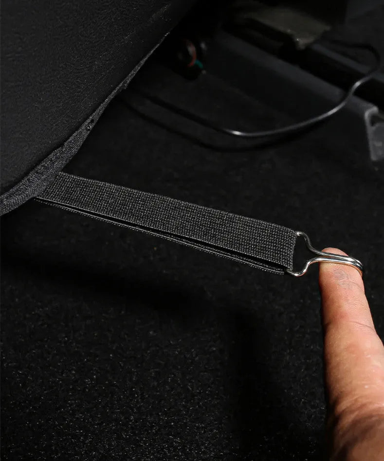 Pair of black leather car seat kick pads showing single pocket and full 68cm by 42cm coverage