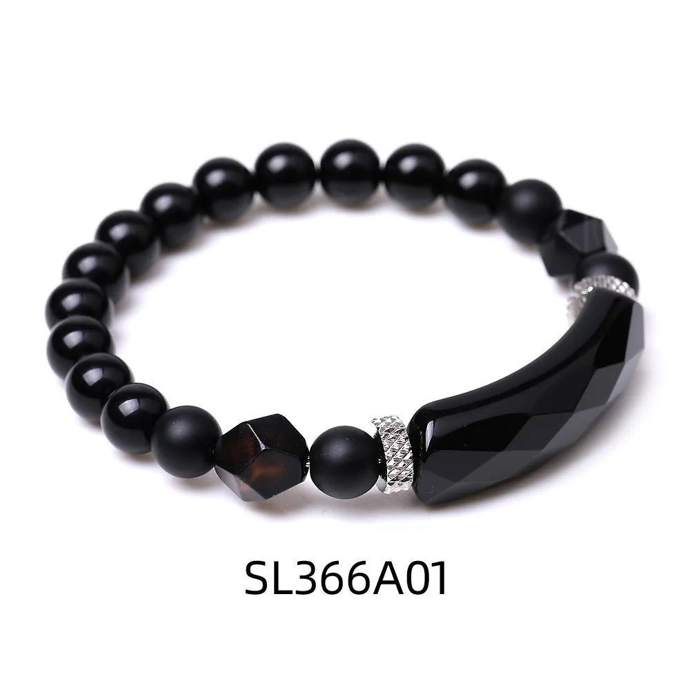 Handmade black agate diamond cut bracelet with geometric fan design on wrist