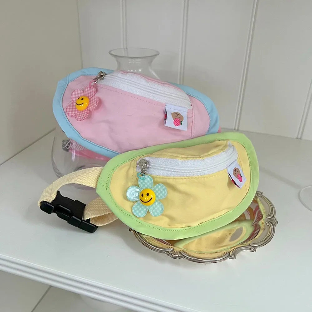 Powder blue, yellow, green, and pink backpack-style carrier for small dogs and cats on a white background.