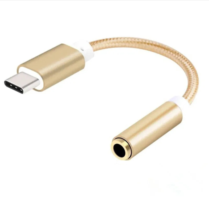 Close-up of a black nylon weave Type-C to 3.5mm female audio adapter cable on a white background.