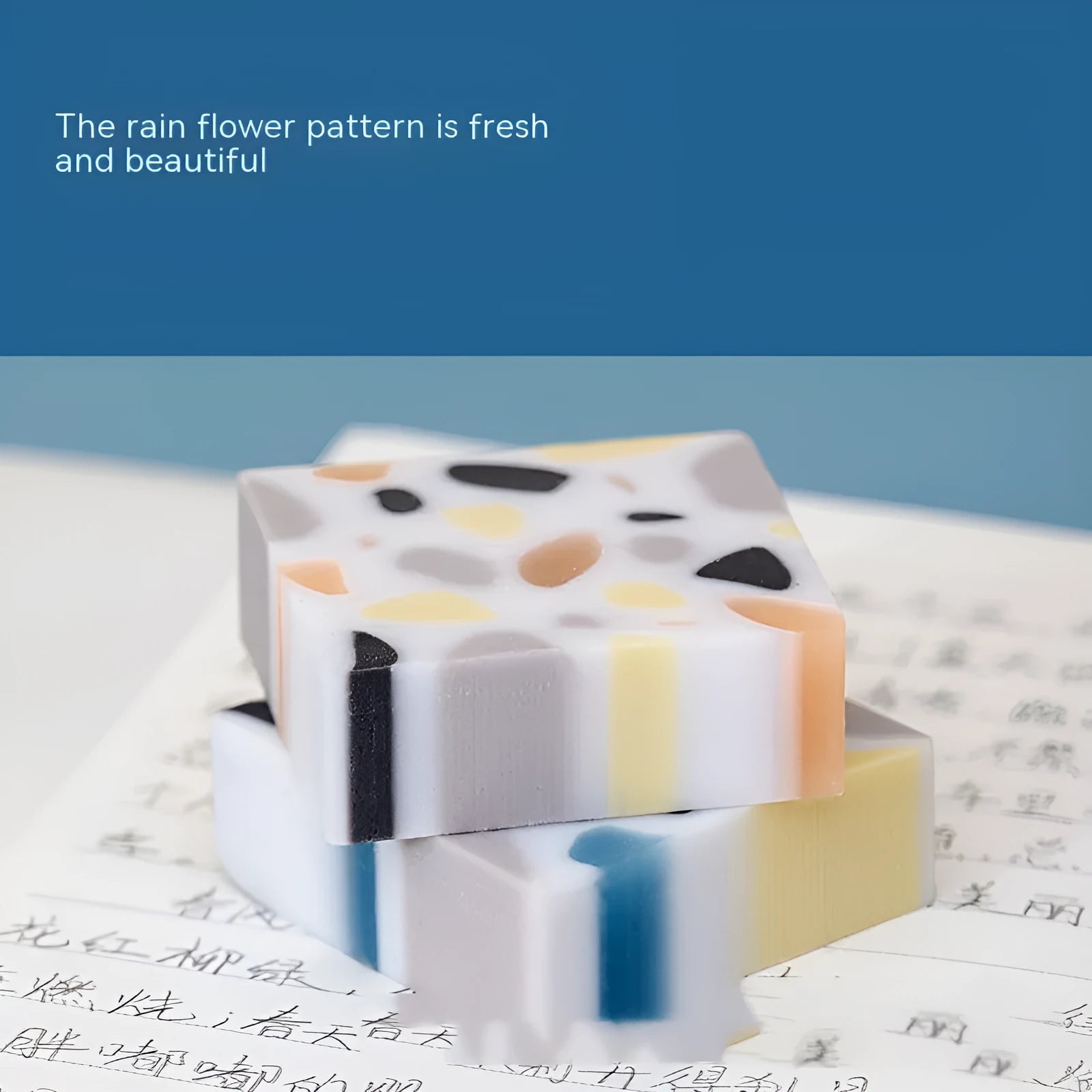 White rubber brick-format eraser for students on a plain background