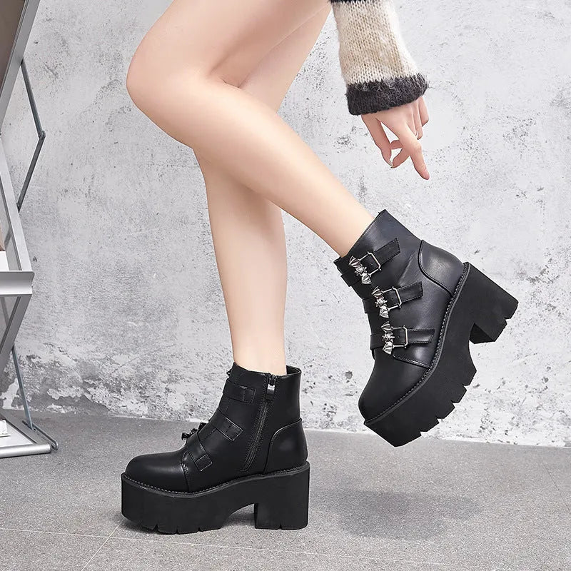 Women's black Harajuku punk ankle boots with bat buckle, side zip, and thick heel.