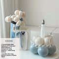 Round shaped balloon bouquet cake decoration DIY kit with colourful balloons arranged as party centrepiece