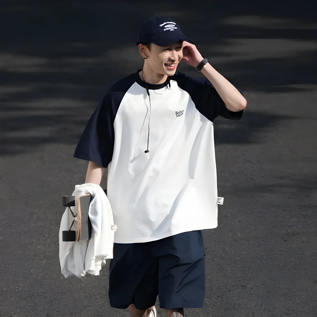 Men's blue Japanese raglan sleeve T-shirt with loose pullover fit on hanger