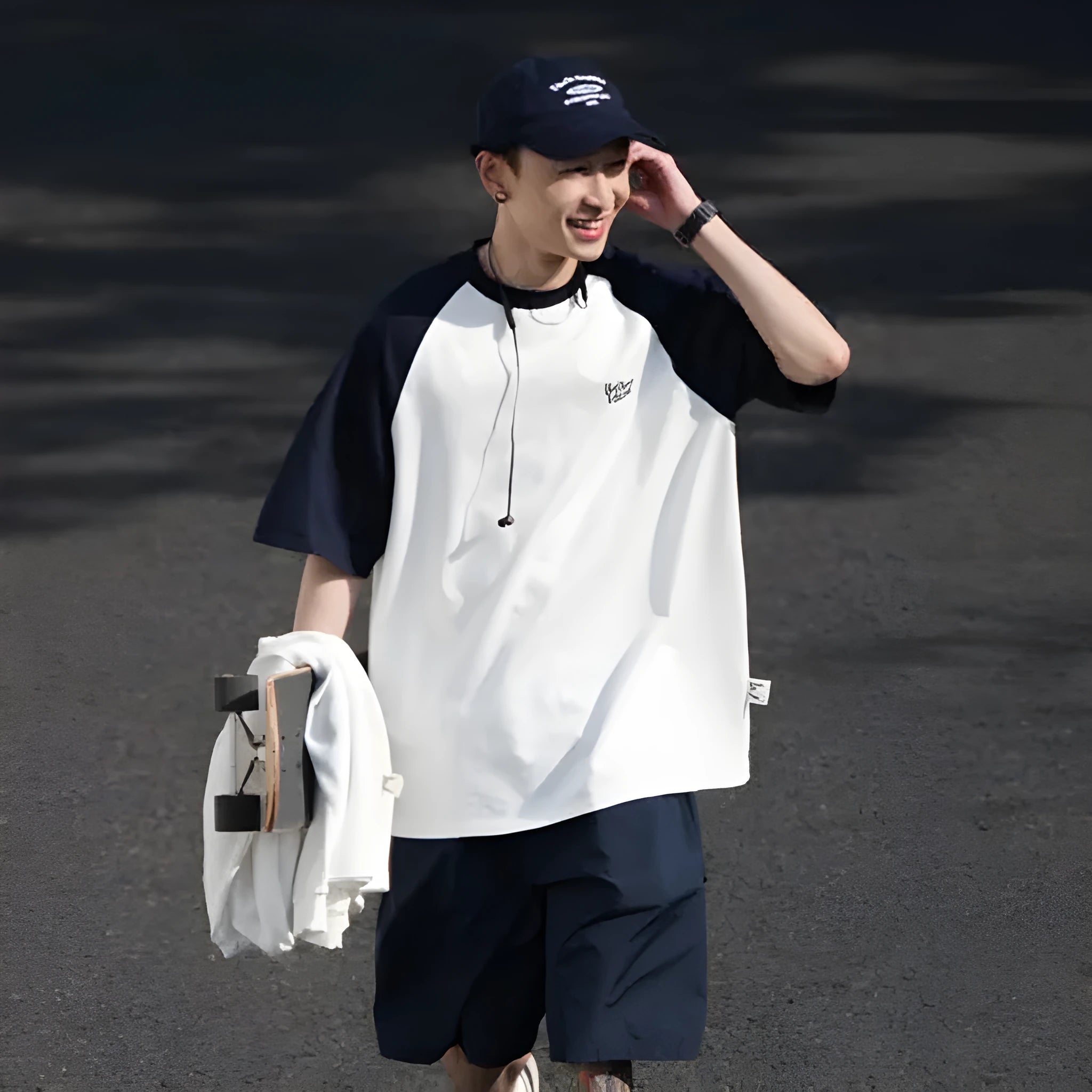 Men's blue Japanese raglan sleeve T-shirt with loose pullover fit on hanger