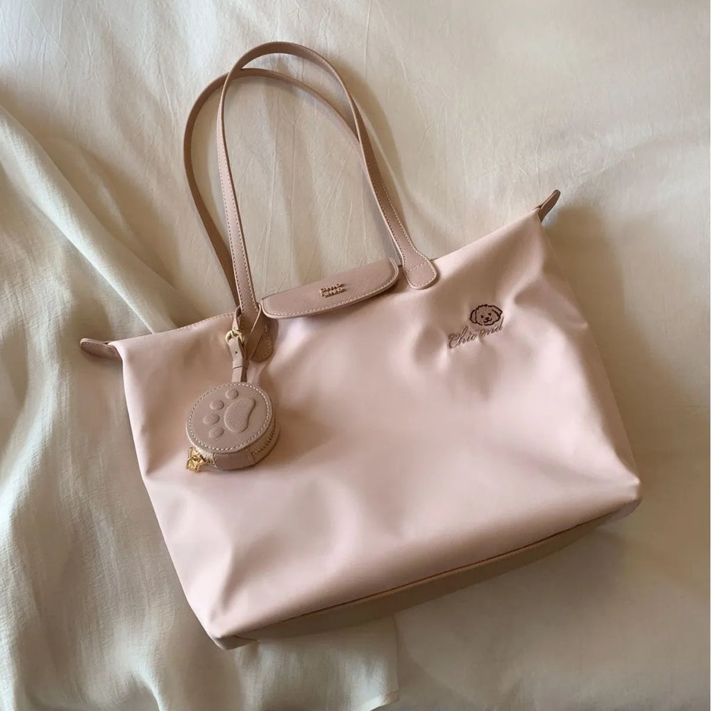 Oxford cloth pink shoulder tote bag with internal mobile phone compartment and sandwich pocket design