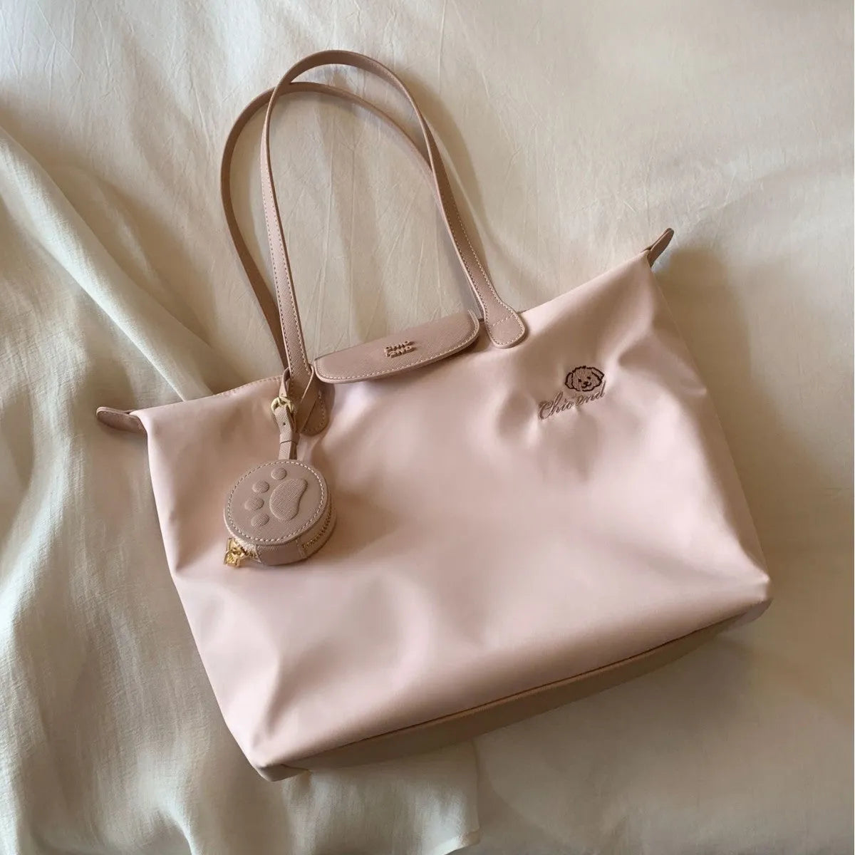Oxford cloth pink shoulder tote bag with internal mobile phone compartment and sandwich pocket design