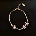 Copper geometric fashion bracelet with zircon inlay and quadrilateral design in gold colour