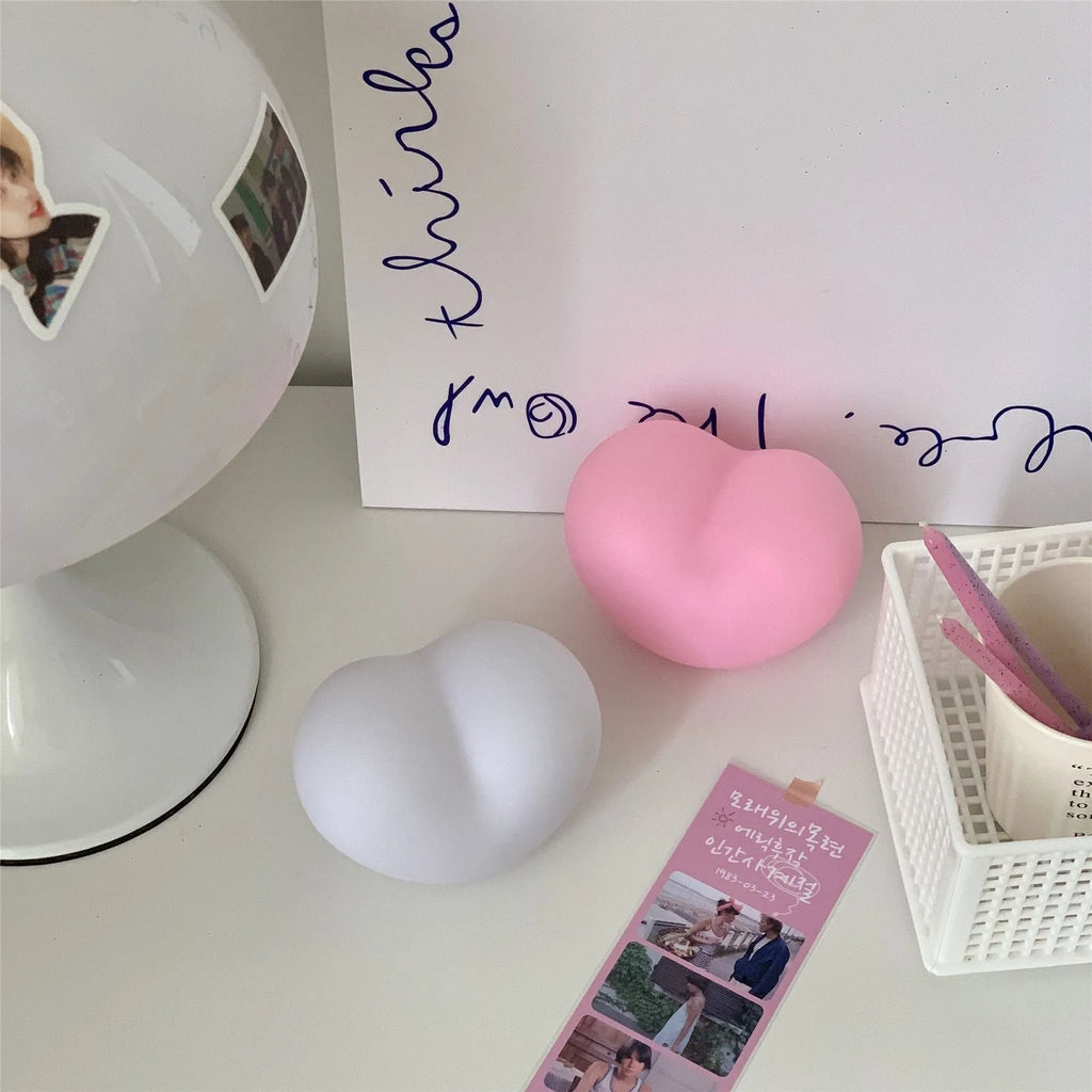 Vinyl atmosphere lamp in pink and white colours showing small and large size options for decorative ambient lighting