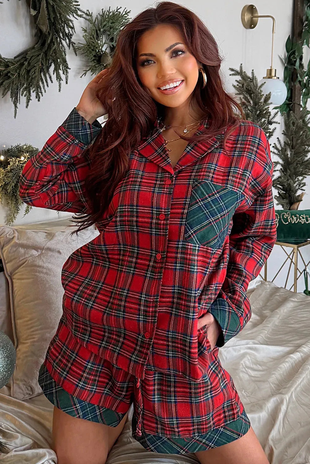 Red plaid Christmas pyjama set with contrast patches, showing long sleeve shirt and matching shorts