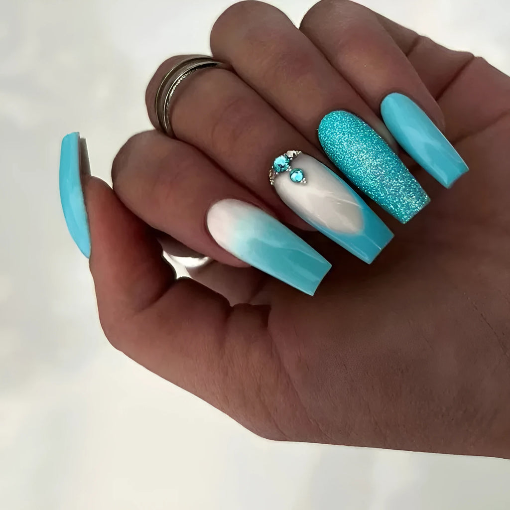Long ballet false nails with blue diamond glitter debris effect