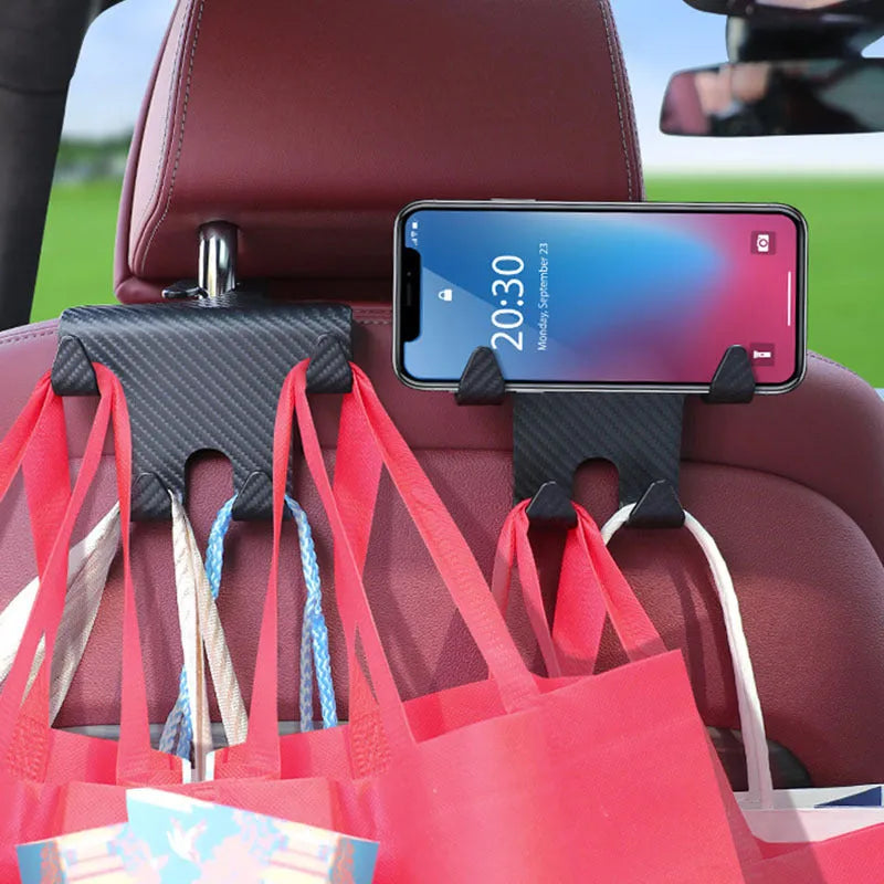 Black ABS plastic car hook with an integrated mobile phone holder bracket for rear seat organisation.