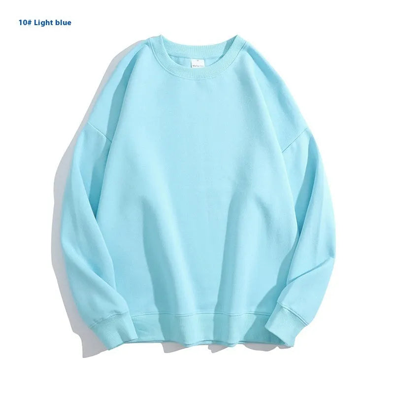 A loose-fitting, off shoulder cotton pullover sweater in a solid colour with long sleeves.