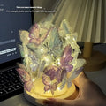 Butterfly night lamp with glass lampshade and raw wood base measuring 12x15cm