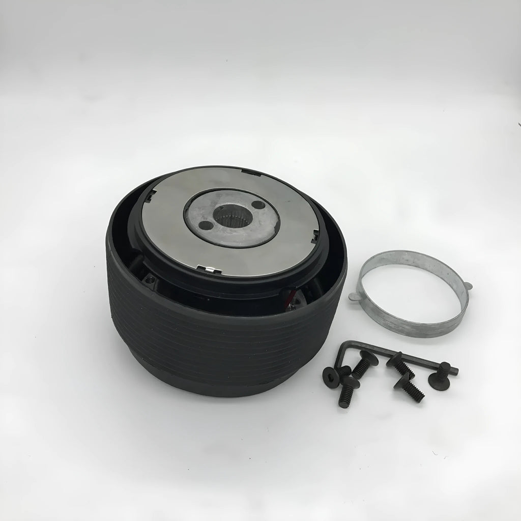 Black plastic and aluminium steering wheel connector hub adapter for Mazda R-2 model