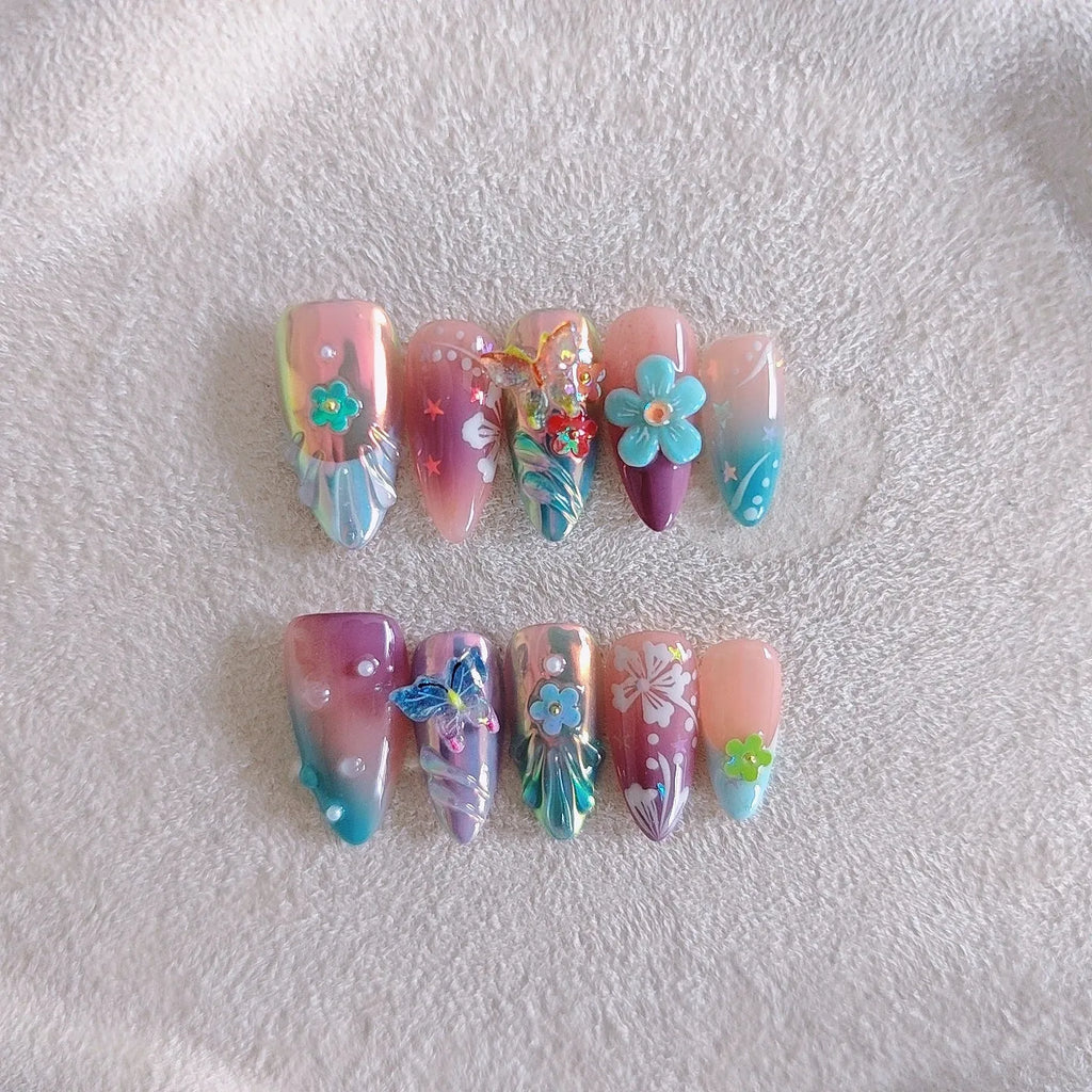 Handmade colourful nail art sculptures with embossed flower and butterfly patterns in four sizes