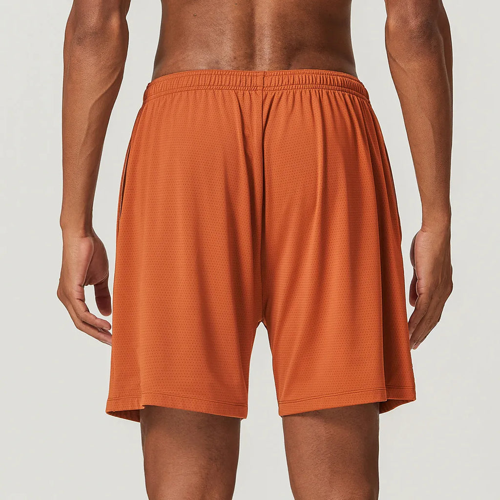 Men's sky green quick-drying running shorts with mid-waist design on a plain background.