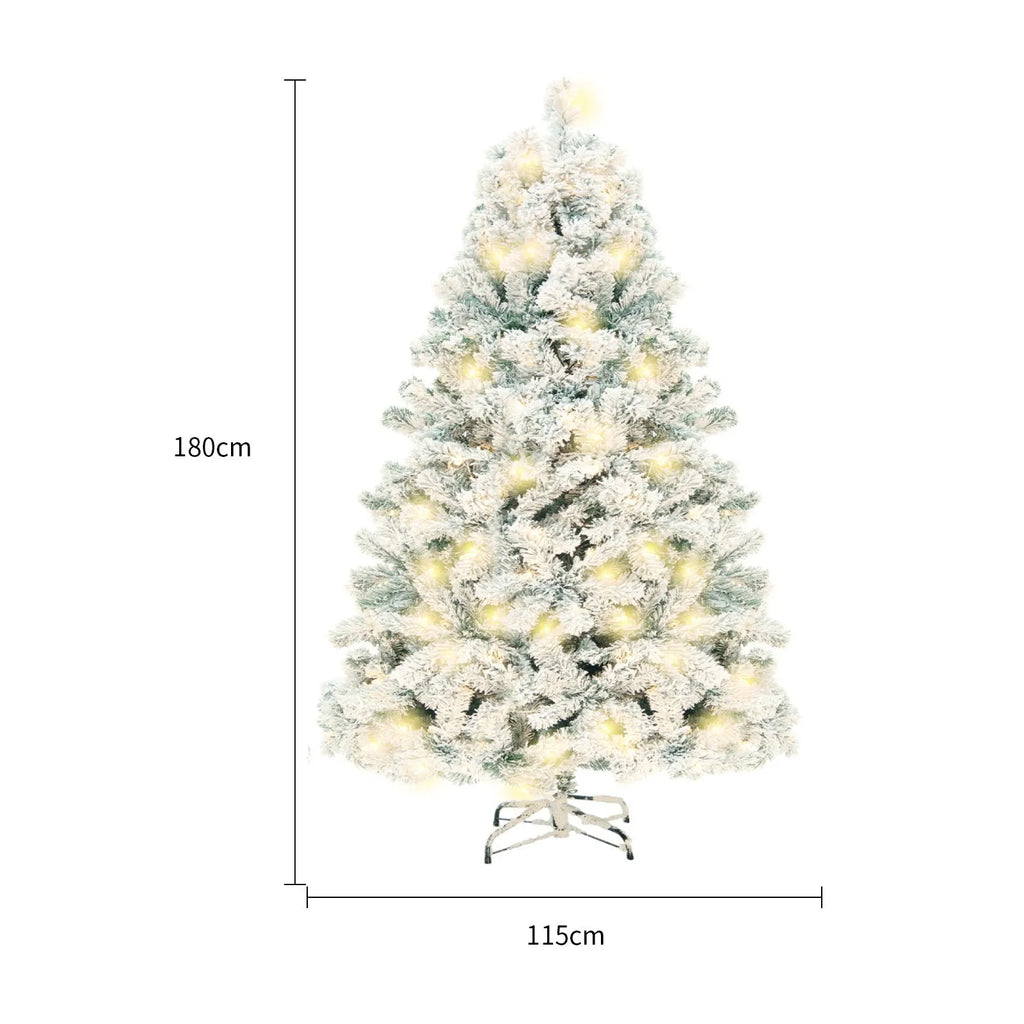 Artificial snow Christmas tree with green and white PVC branches on a metal stand