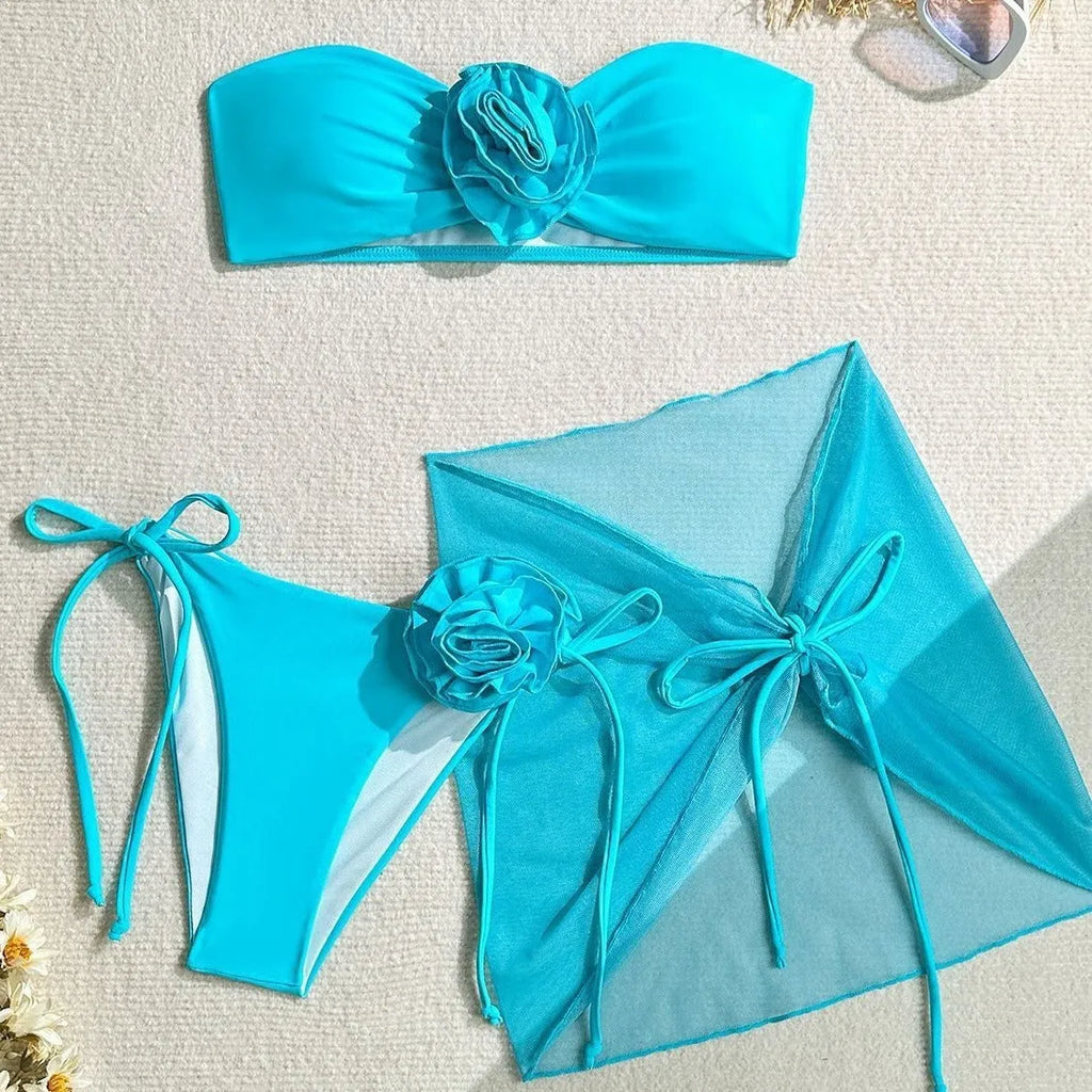 Women's tube top swimsuit with three-dimensional flower tie in pink, blue or purple colours