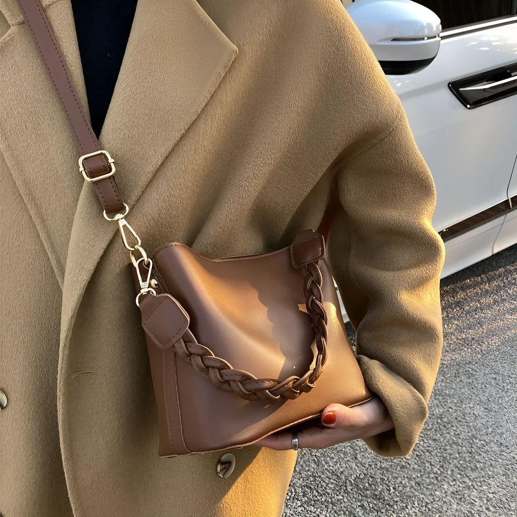 Retro style woven PU crossbody bucket bag in neutral colour