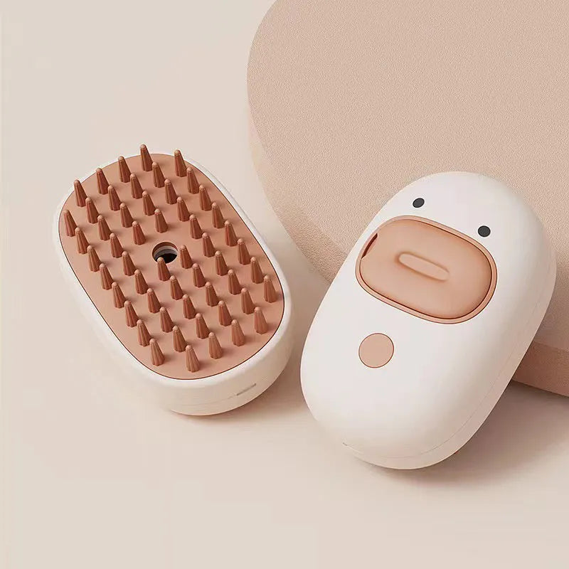 White or yellow rechargeable steam pet brush with water tank for dog and cat grooming