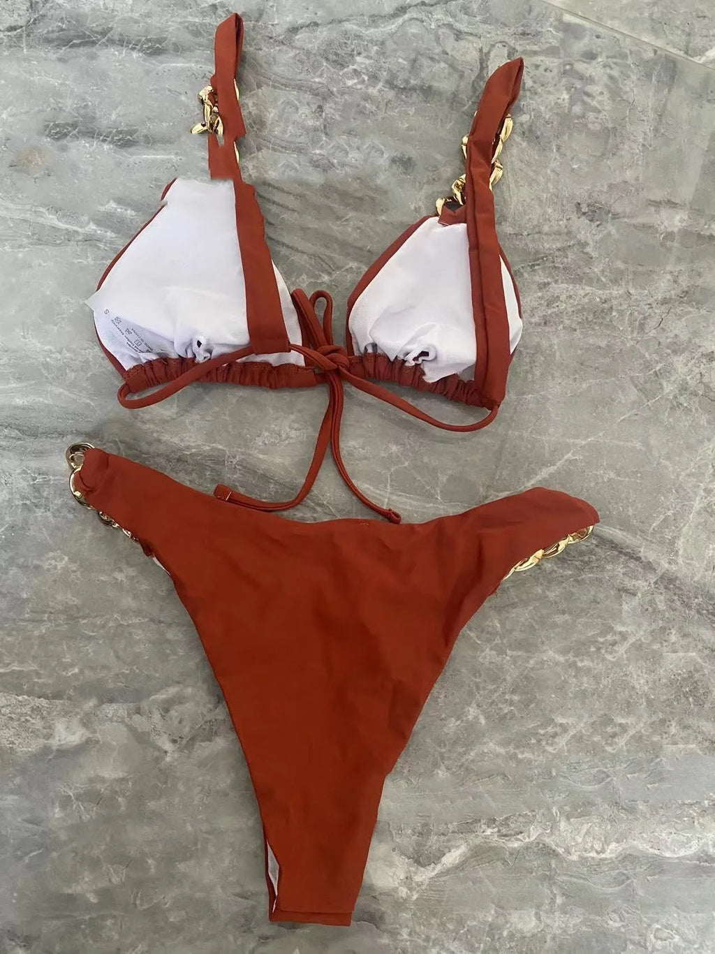 Brown women's tube-top bikini swimsuit with ring-tether detailing and push-up design
