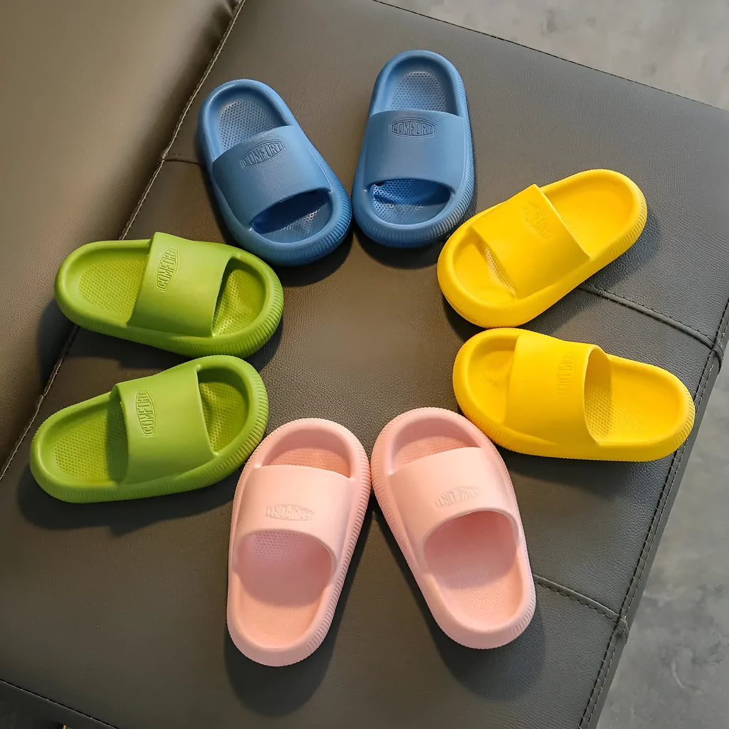 Children's EVA slippers in bright colours with non-slip soles, showing size options from 15.5cm to 21.5cm