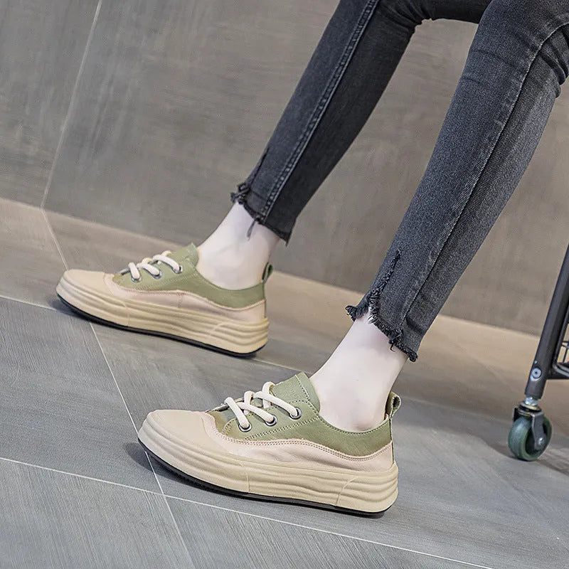 Women's leather low-top platform sneakers in matcha green, purple, and orange colours with front lace-up.