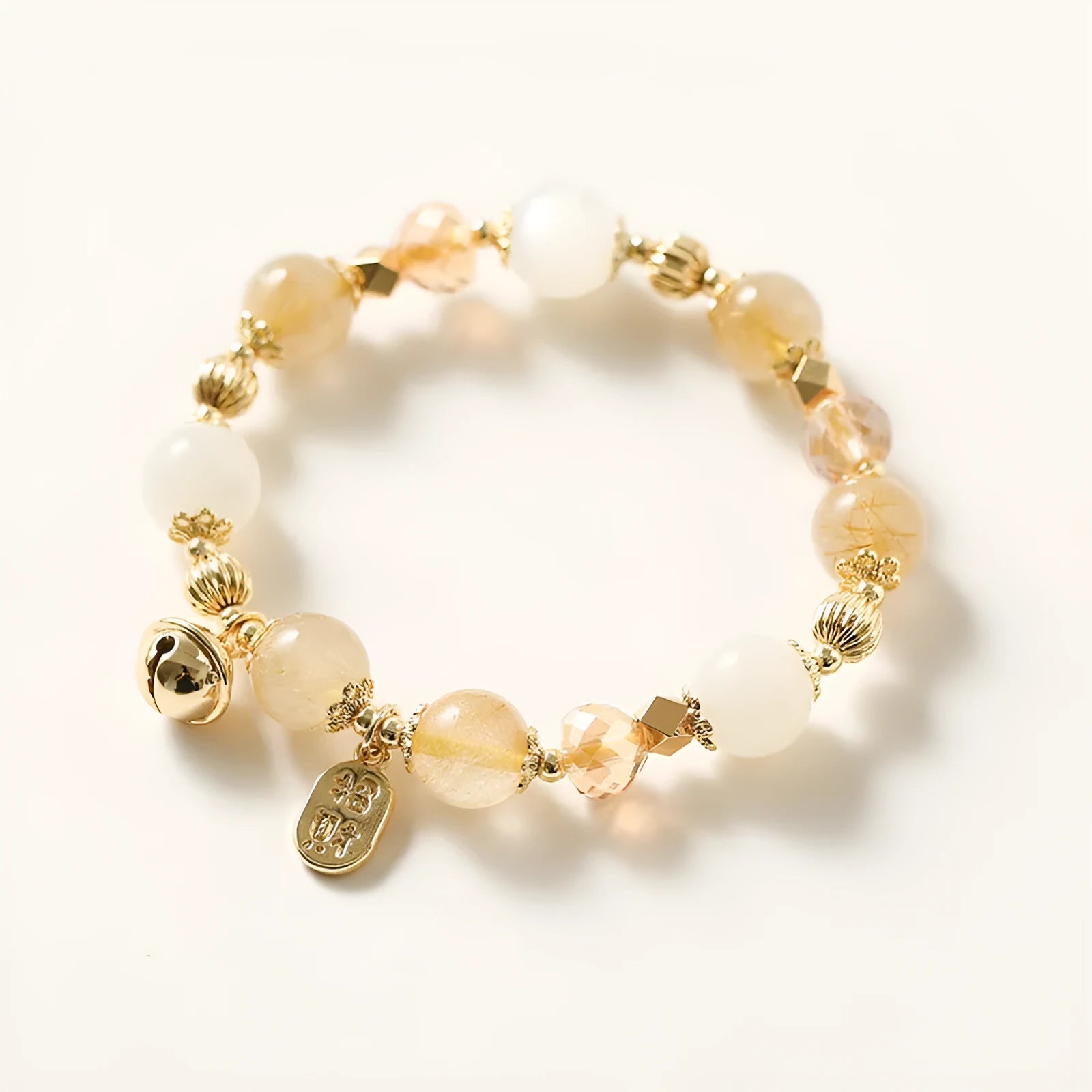 Lucky Fortune gold coloured Korean style bracelet with a single rutilated quartz crystal bead.
