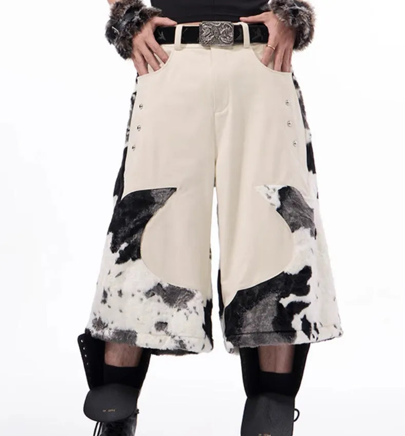 Milk fibre fur cropped pants in a checkered pattern, shown in a youthful city style.