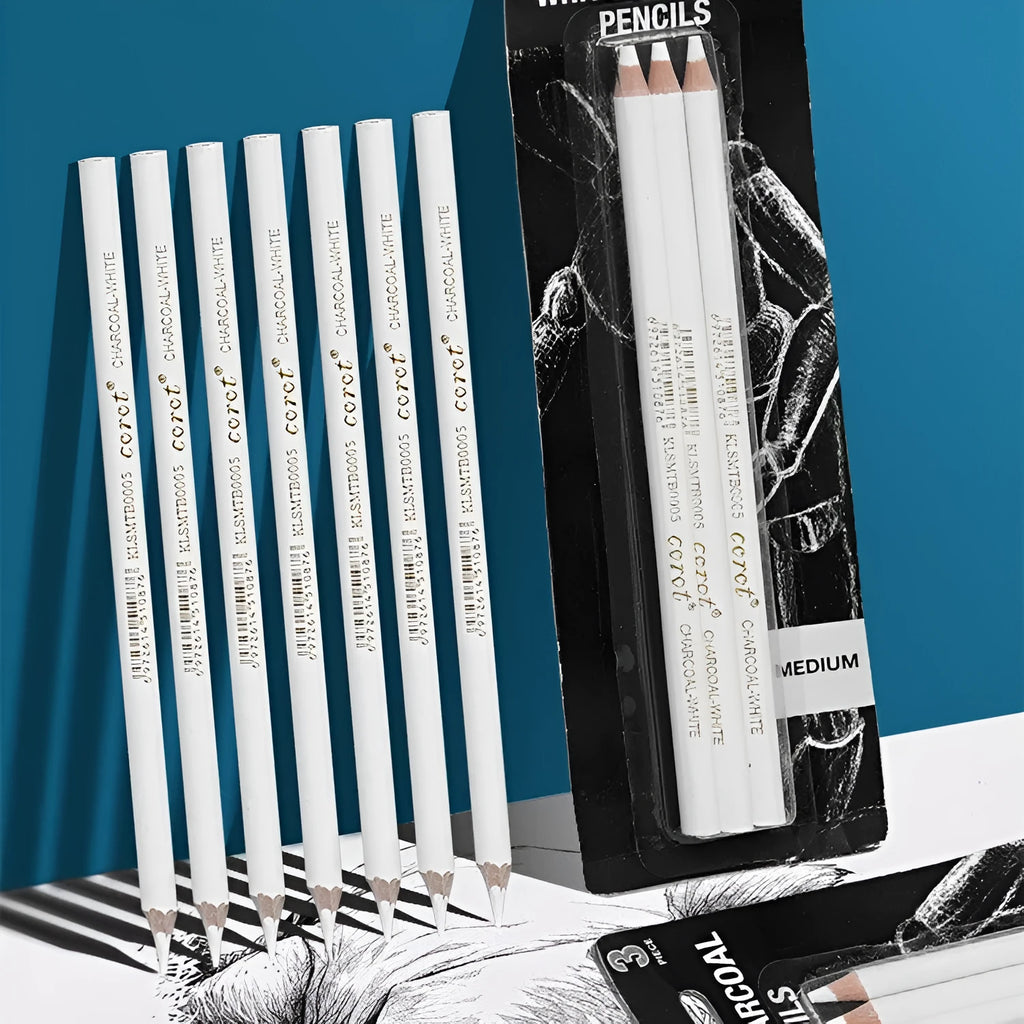 Three white charcoal pencils with wooden casings for drawing and highlighting