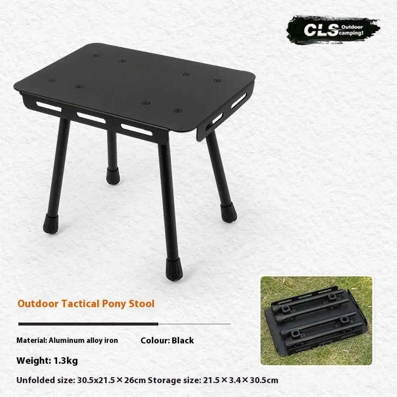 CLS aluminium folding camping stool shown in army green, converted into a small table.