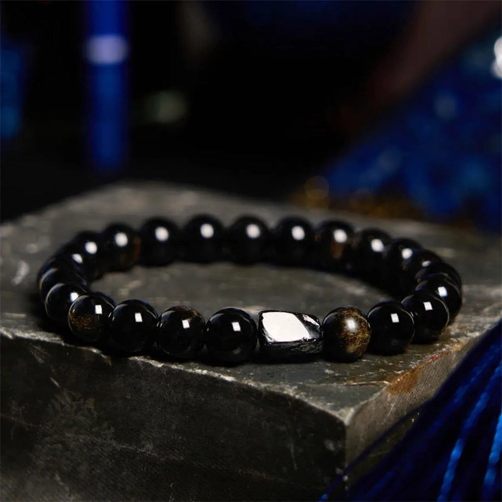 Natural obsidian stone bracelet with constellation design on 8mm beads.