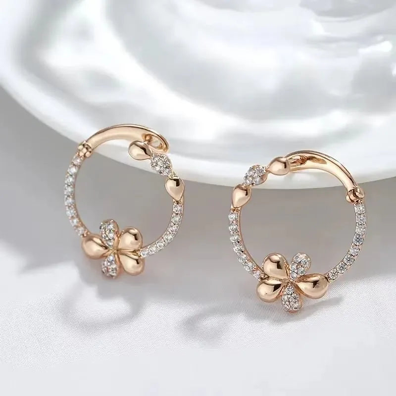 Copper geometric round ring earrings with electroplated finish, approximately 2.5 cm diameter