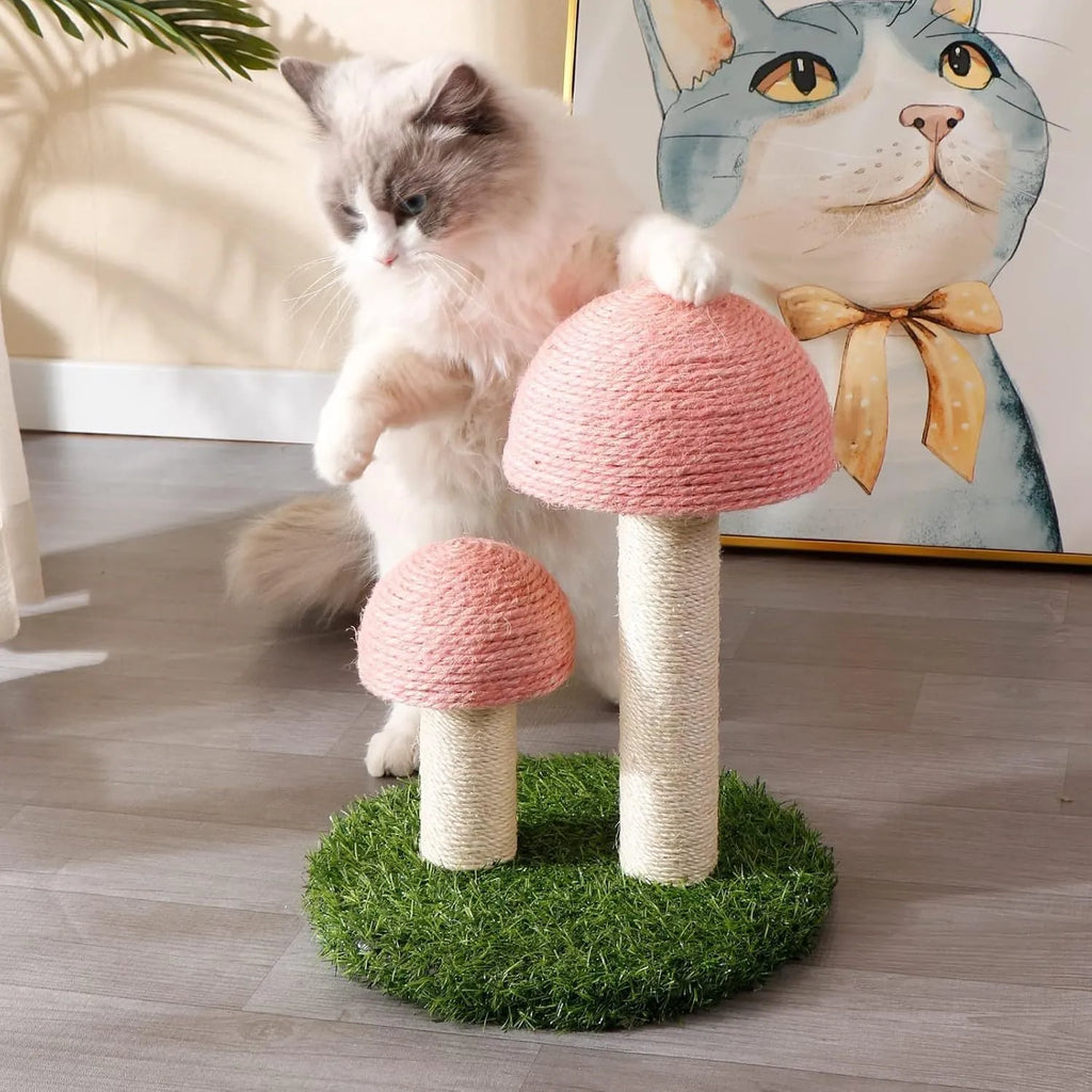 Pink mushroom-shaped cat scratching post with natural sisal caps on a sturdy base for small cats.