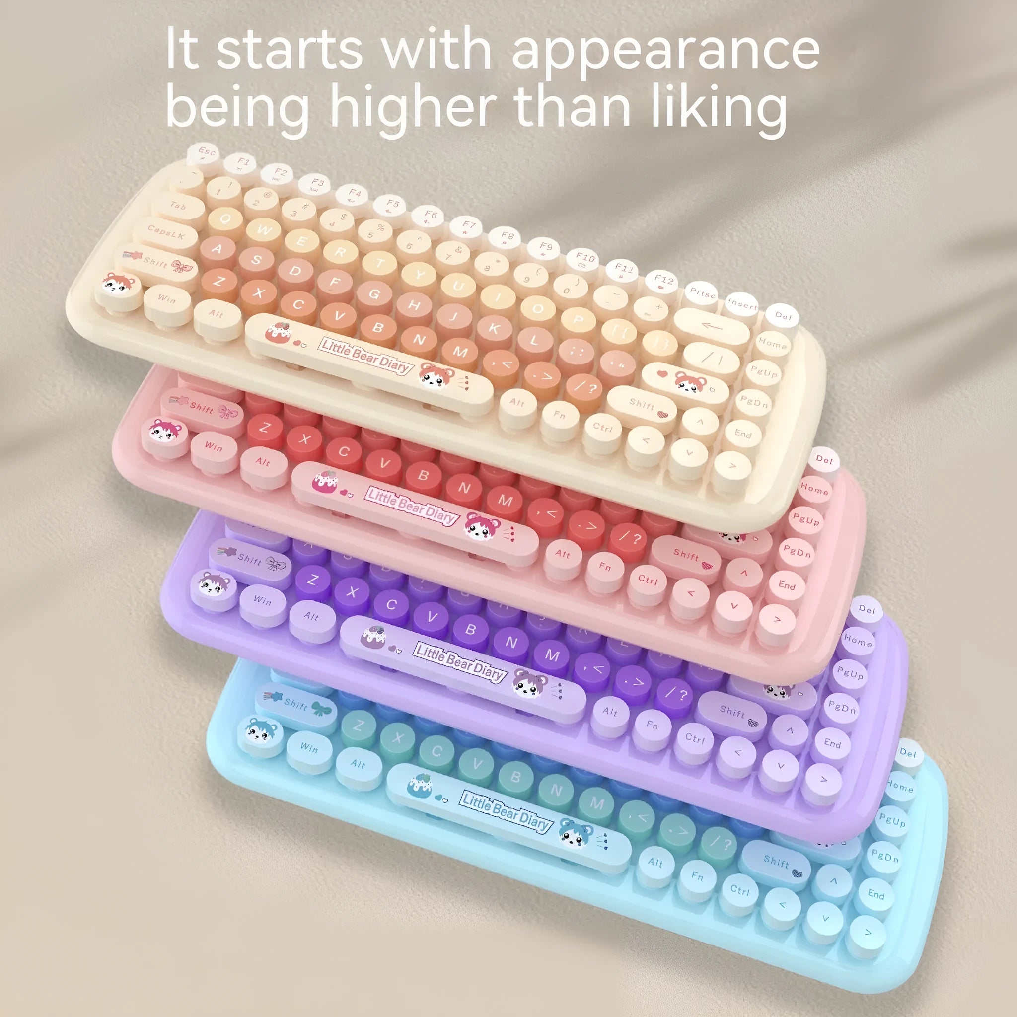 Pink mini cartoon wireless keyboard and mouse set with compact dimensions on desk