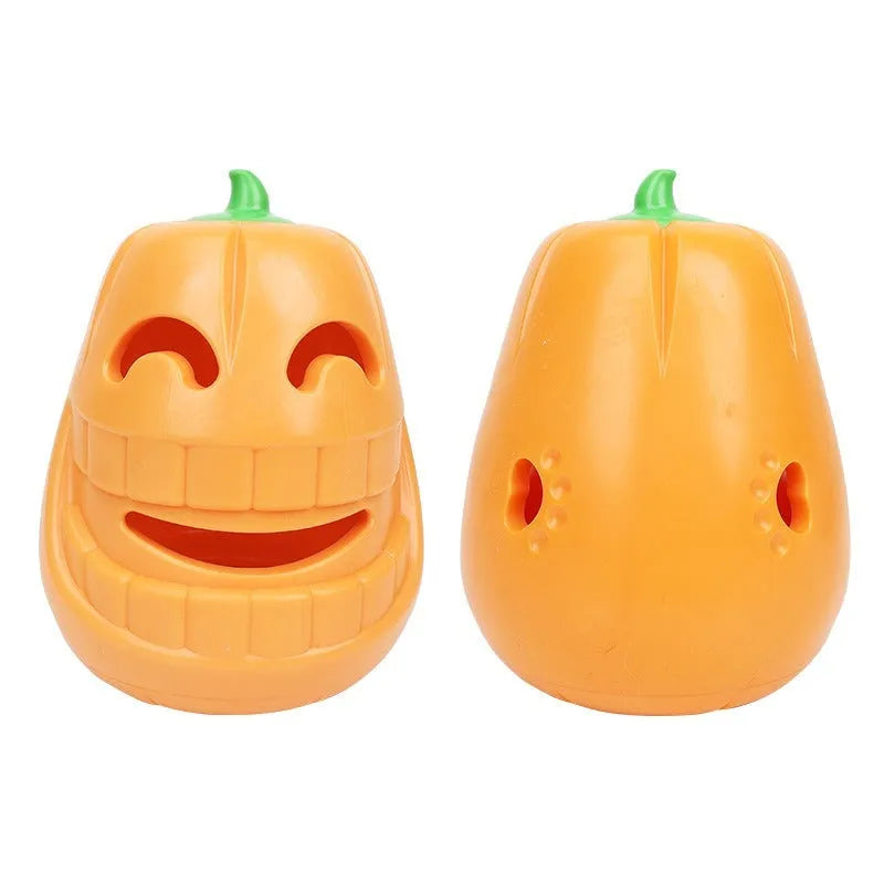 Orange Halloween pumpkin shaped dog chew toy with a treat-dispensing funnel hole.