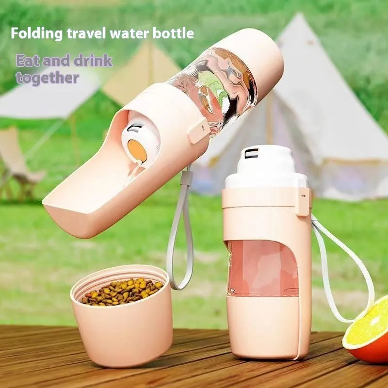 Gray 2-in-1 travel dog water bottle and feeder with lanyard, showing folding design and drinking cup.