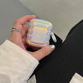 Silicone AirPods case with detailed magic laser and ring pattern design.