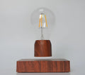 Magnetic levitation floating light bulb with imitation wood base