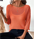 Women's off-shoulder knitted top in light blue with 3D pattern and 3/4 sleeves.
