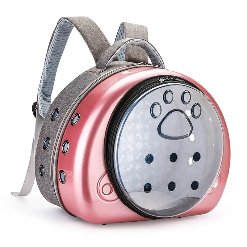 Transparent space capsule cat carrier in rose gold colour with hard-sided design