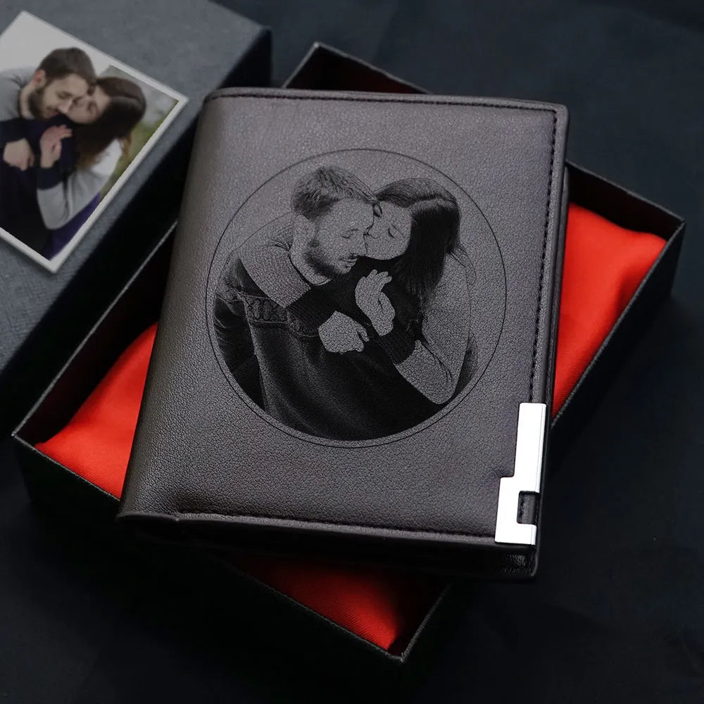 Men's leather wallet with a zipper closure, presented as a gift.