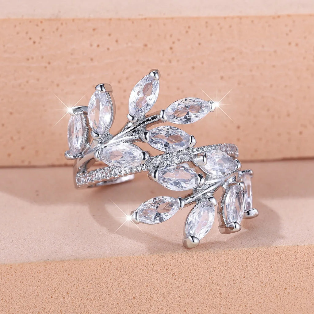 Adjustable copper leaf-shaped fashion ring with a central horse eye zircon stone in a rose gold finish.