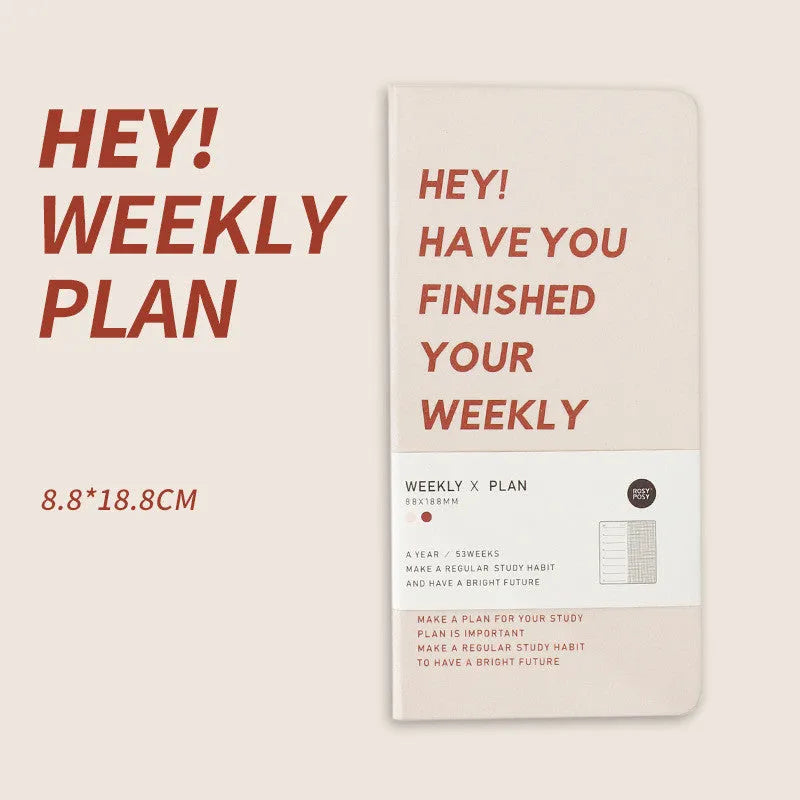 Weekly Plan Diary Handbook with 100 pages in four colour options blue brown green purple on a wooden table