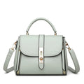 Soft leather women's messenger bag in square vertical design with shoulder strap