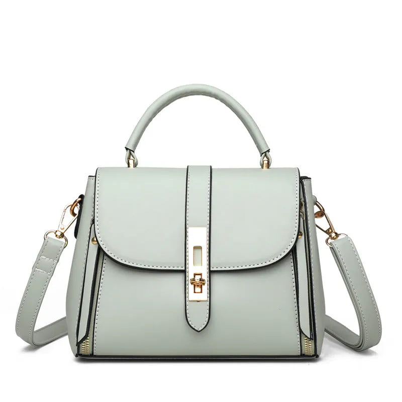 Soft leather women's messenger bag in square vertical design with shoulder strap
