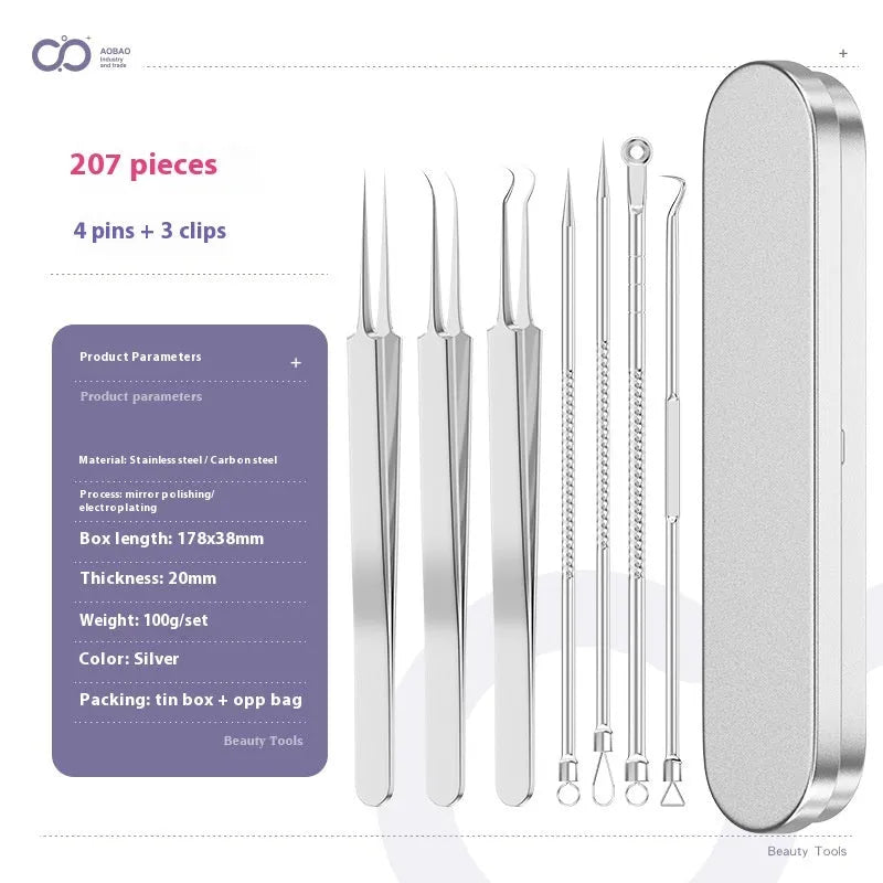 Four metal acne needles with ultra-fine pointed tips laid out in a set.