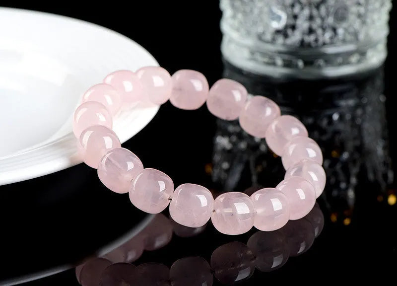 Pink natural crystal bracelet with 11-12mm geometric barrel beads and bamboo-inspired design