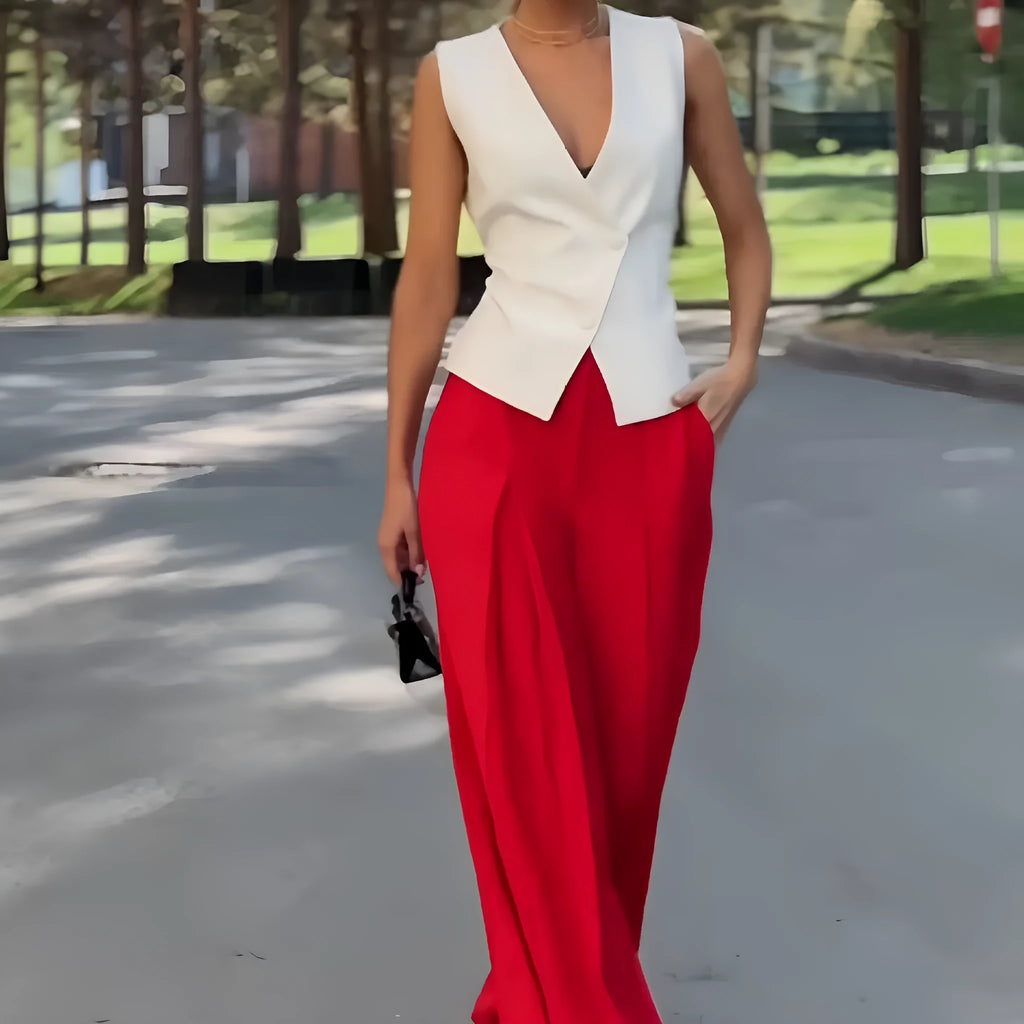 Women's beige two-piece set with deep V-neck sleeveless top and wide leg trousers